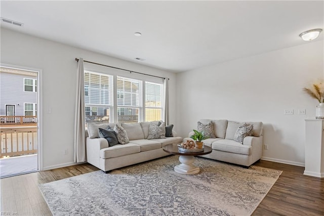 living room with hardwood / wood-style flooring