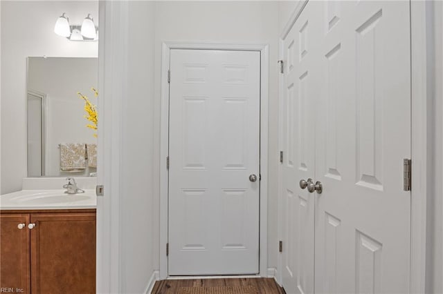 interior space featuring dark hardwood / wood-style floors and sink