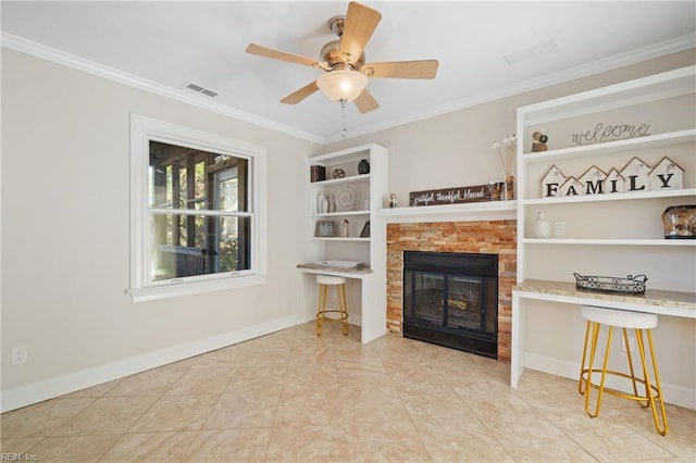 tiled living room with built in shelves, ornamental molding, and ceiling fan