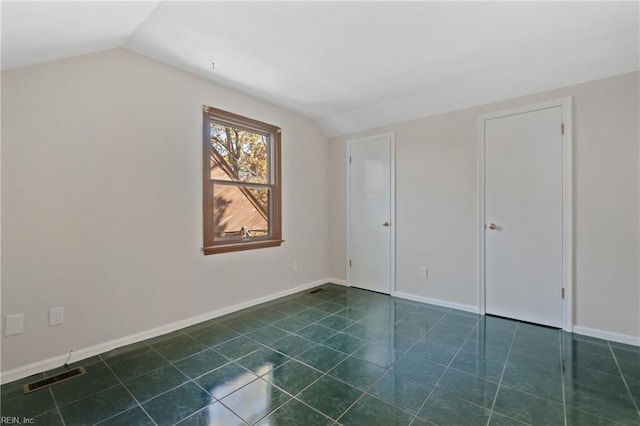 interior space featuring vaulted ceiling