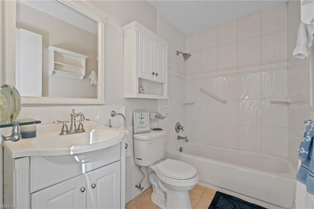 full bathroom with tile patterned flooring, vanity, shower / tub combination, and toilet