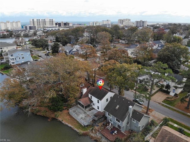 drone / aerial view with a water view