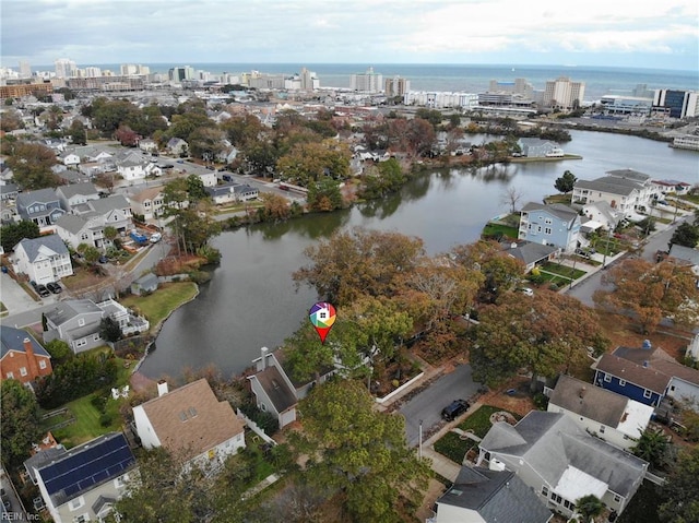 bird's eye view with a water view