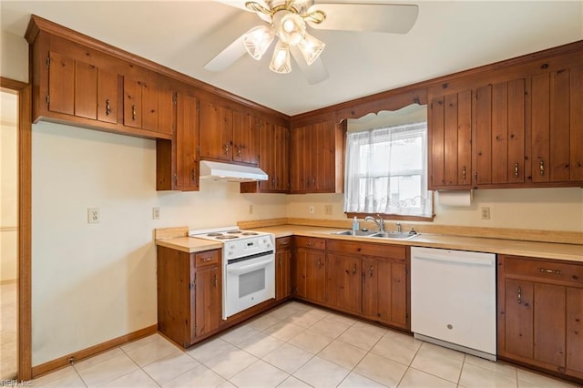 kitchen with ceiling fan, white appliances, and sink