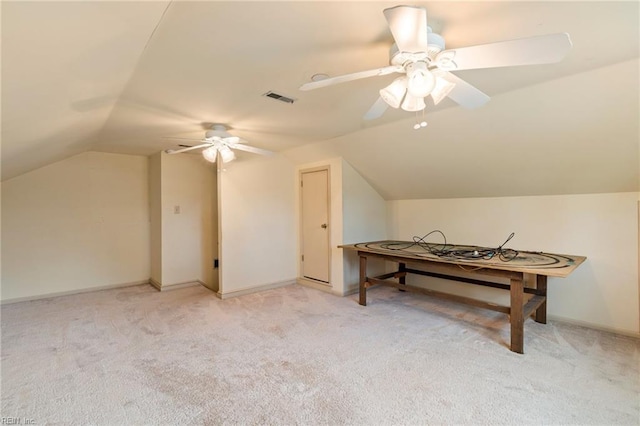 bonus room featuring vaulted ceiling, light colored carpet, and ceiling fan