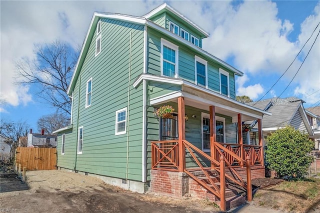 view of front of property featuring covered porch