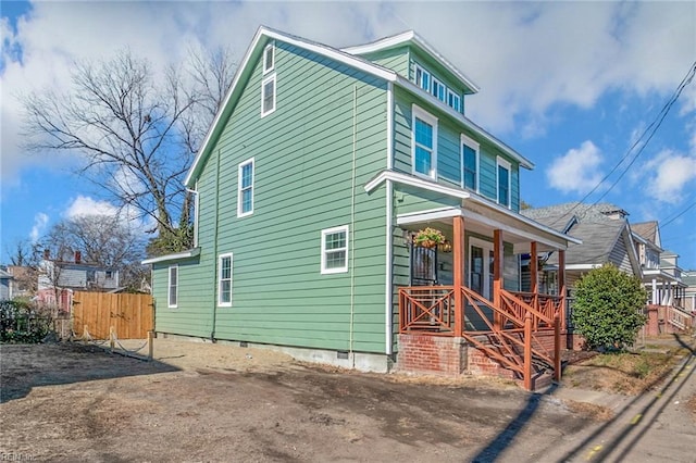 view of home's exterior with covered porch