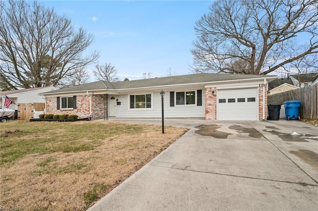 single story home with a garage and a front lawn