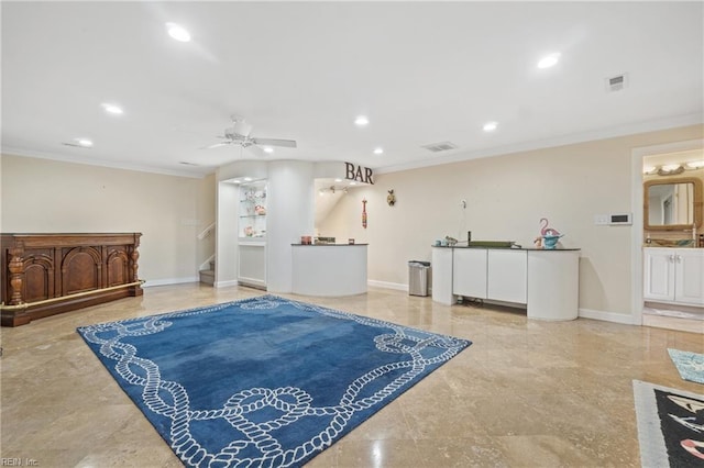 miscellaneous room featuring ornamental molding and ceiling fan