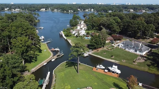 bird's eye view with a water view