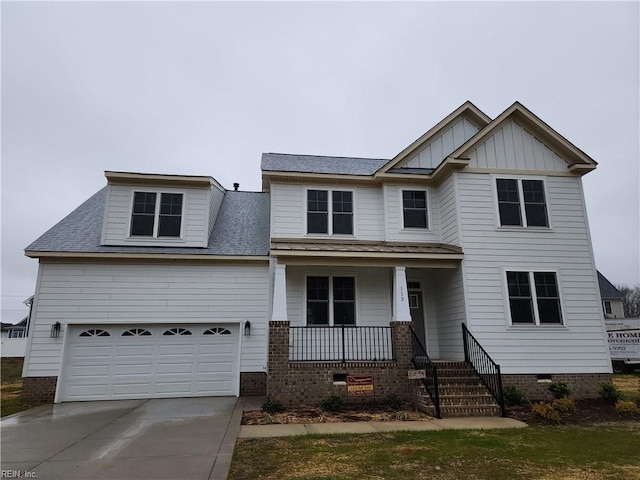 craftsman inspired home with covered porch, a garage, concrete driveway, crawl space, and board and batten siding