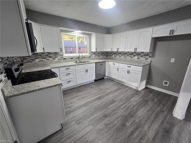 kitchen with sink, stainless steel appliances, wood-type flooring, light stone countertops, and white cabinets