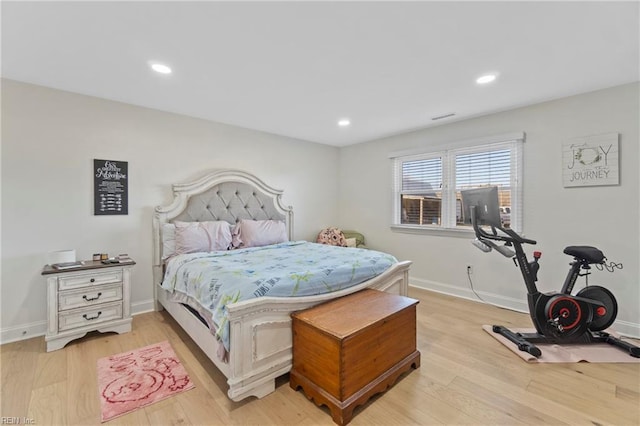 bedroom featuring light wood-type flooring