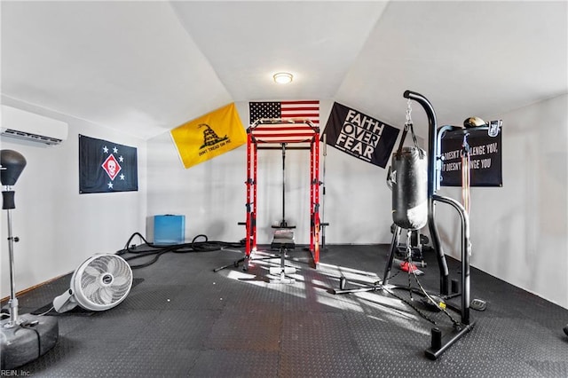 workout room with lofted ceiling and a wall mounted air conditioner