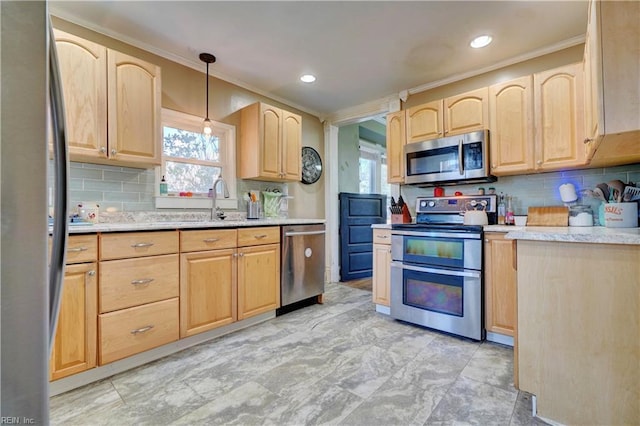 kitchen with appliances with stainless steel finishes, tasteful backsplash, sink, hanging light fixtures, and light brown cabinets