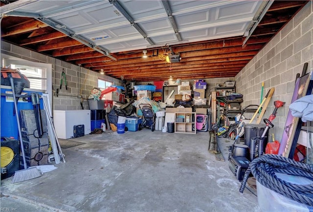 garage featuring a garage door opener