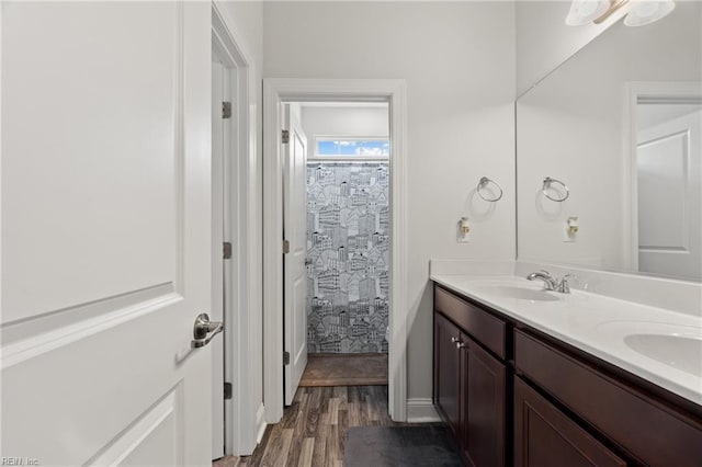 bathroom with vanity, hardwood / wood-style flooring, and a shower with curtain