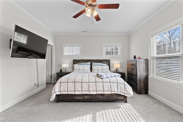 bedroom featuring ceiling fan, ornamental molding, and light carpet