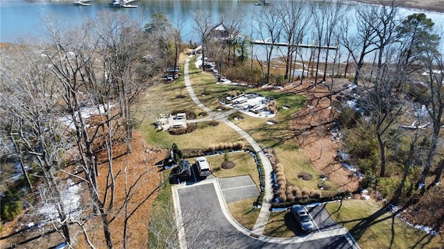 birds eye view of property featuring a water view