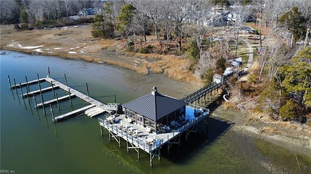 exterior space with a water view