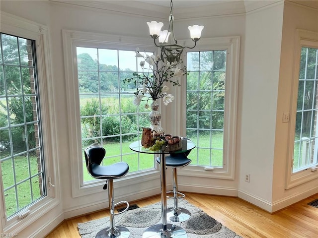 interior space featuring plenty of natural light and a chandelier