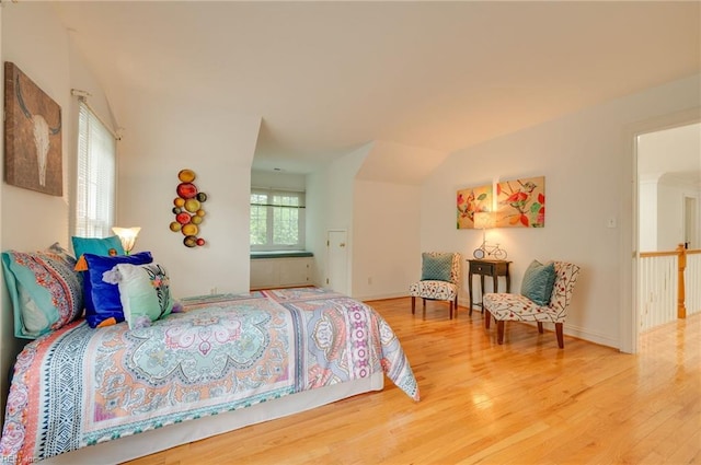 bedroom with wood-type flooring