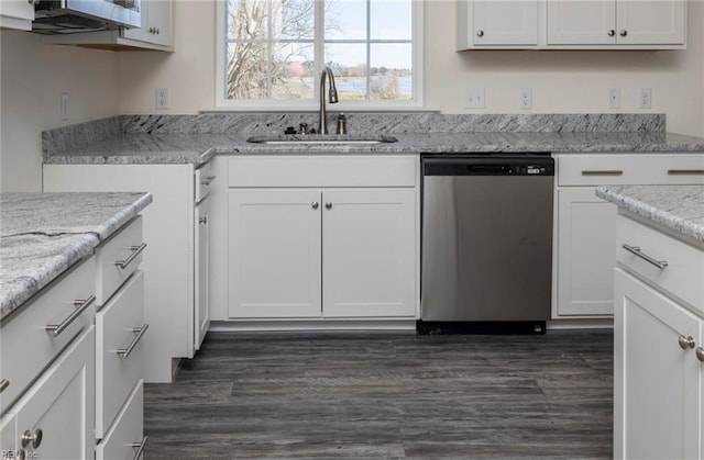 kitchen featuring white cabinetry, sink, light stone counters, and dishwasher