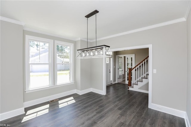 unfurnished dining area featuring crown molding and dark hardwood / wood-style flooring