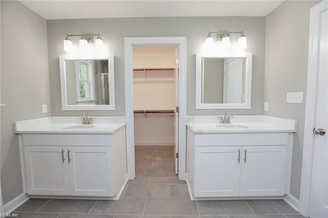 bathroom featuring vanity and tile patterned flooring