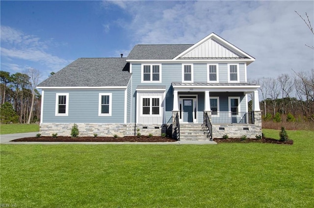 craftsman house with a front lawn and covered porch