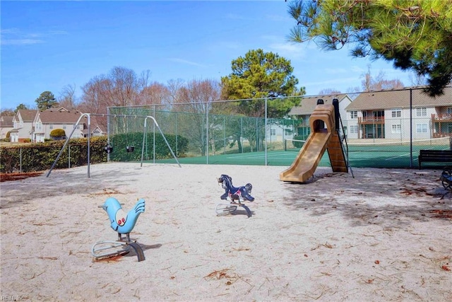 view of playground with tennis court