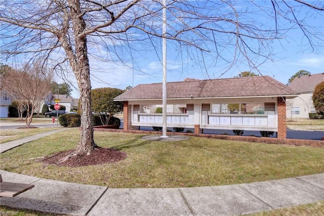 view of front of house with a front yard