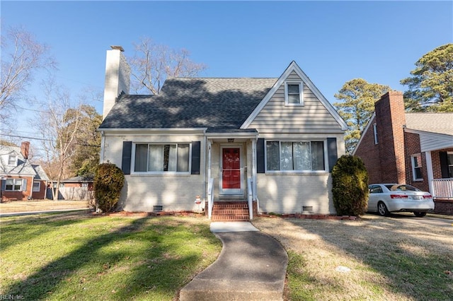 view of front of home featuring a front lawn