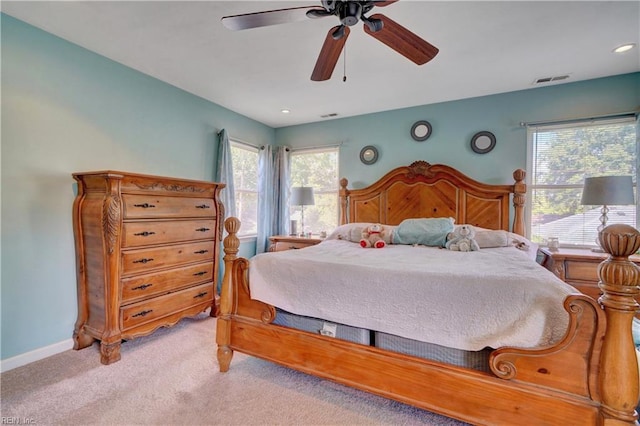 carpeted bedroom with ceiling fan