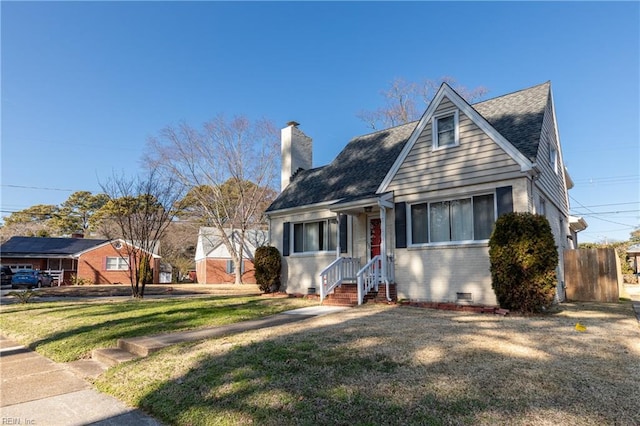 view of front of house with a front lawn