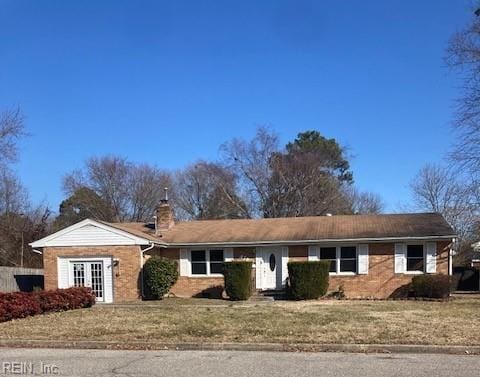 single story home with a front yard