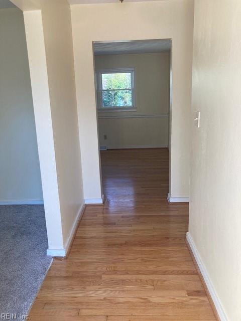 hallway featuring light hardwood / wood-style flooring