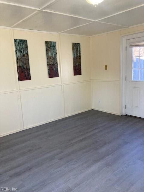 unfurnished room featuring dark wood-type flooring