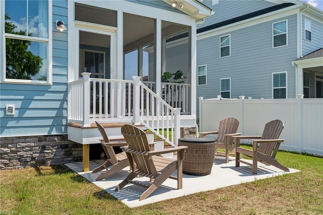 view of patio / terrace featuring an outdoor fire pit