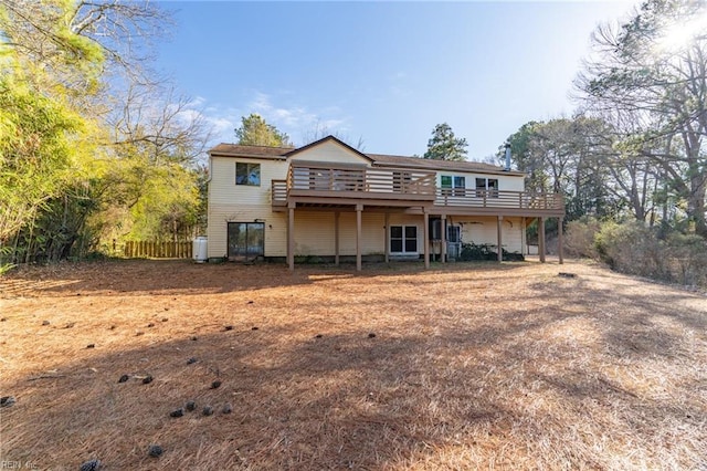 rear view of property with a deck