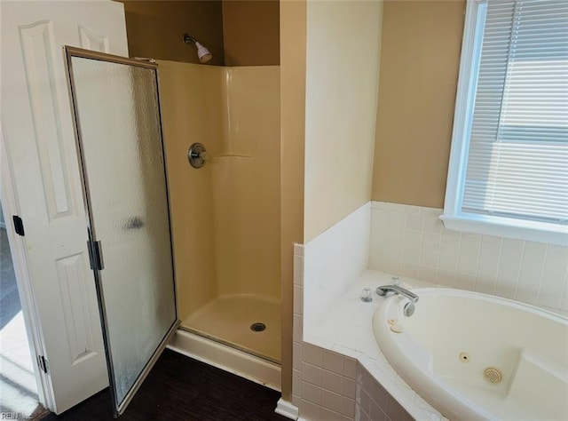 bathroom with independent shower and bath