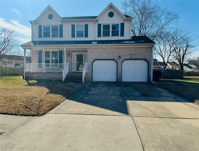 view of front facade featuring a porch, a garage, and a front yard