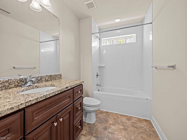 full bathroom featuring vanity, toilet, tile patterned flooring, and shower / bathing tub combination