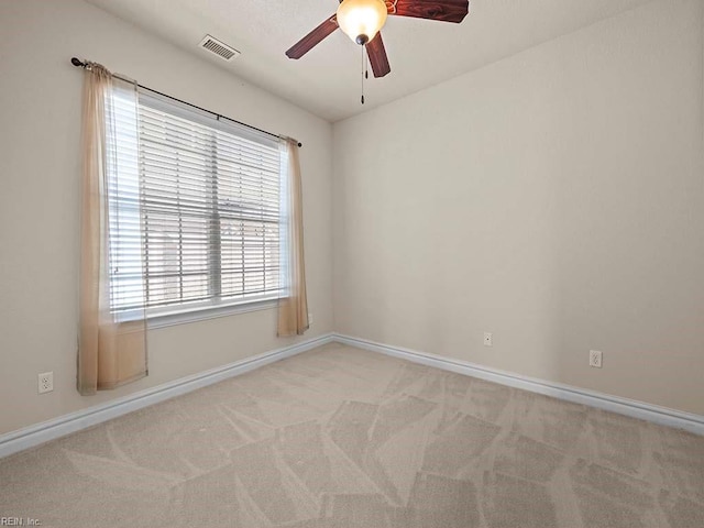 carpeted empty room with ceiling fan