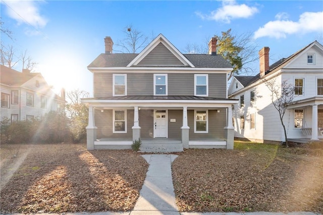 view of property with a porch