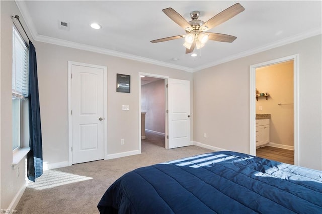 carpeted bedroom featuring connected bathroom, crown molding, and ceiling fan