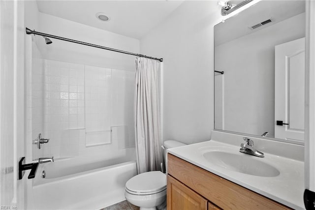 full bathroom featuring shower / tub combo, vanity, and toilet