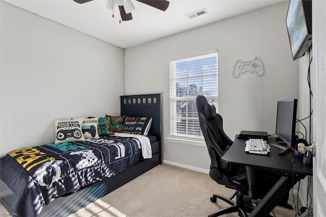 carpeted bedroom with ceiling fan