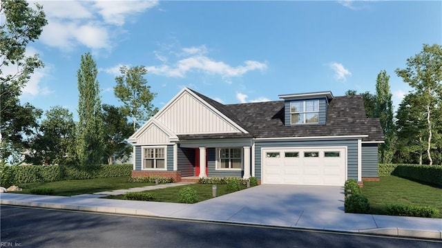 view of front of home featuring a garage and a front yard