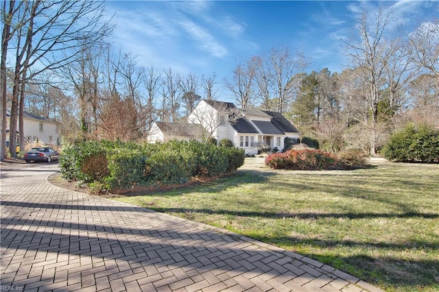 view of property exterior featuring a yard